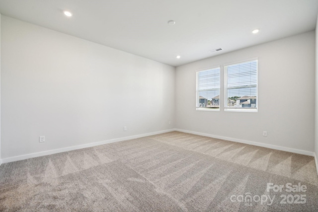 empty room with carpet floors