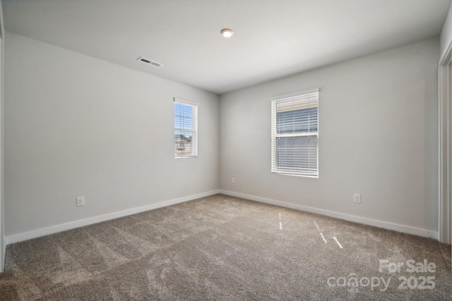 view of carpeted spare room