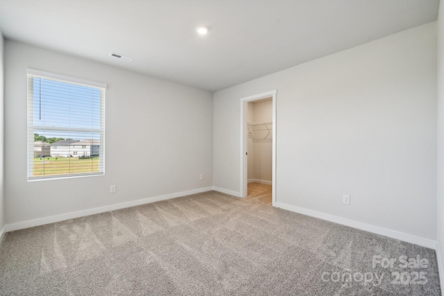 spare room featuring carpet flooring