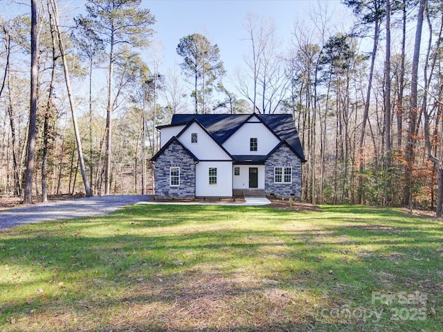 248 Pioneer Dr Unit 990, Mount Gilead, NC 27306 - view of front facade featuring a front lawn