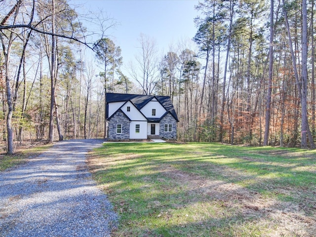 view of front of property with a front lawn