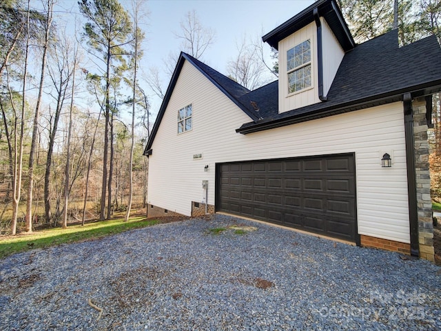 view of home's exterior with a garage