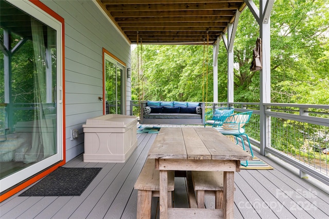 deck featuring outdoor lounge area