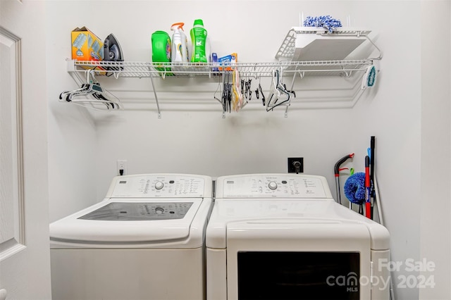 laundry area featuring separate washer and dryer