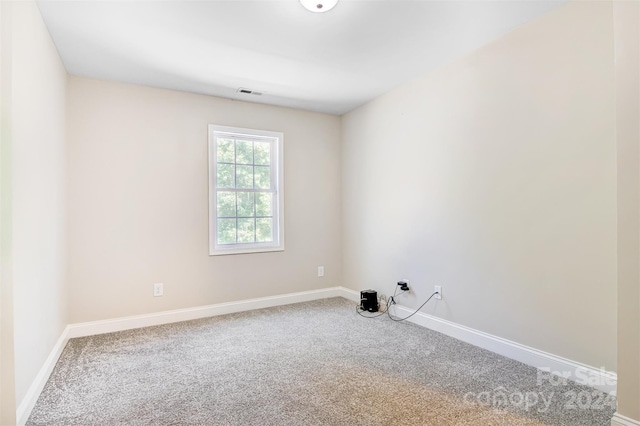 empty room featuring carpet