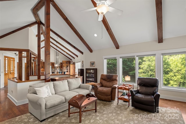 living room featuring beamed ceiling, high vaulted ceiling, hardwood / wood-style floors, and a wealth of natural light