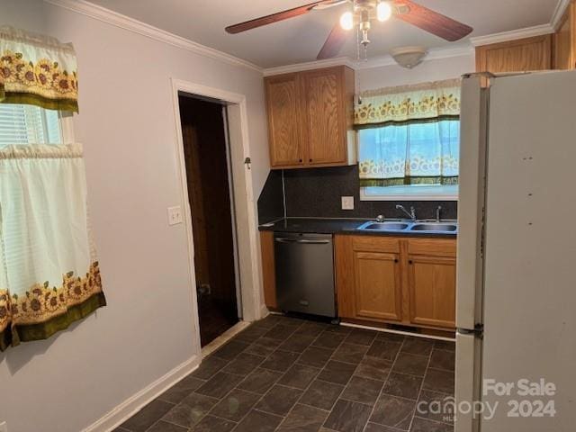 kitchen featuring dark tile floors, white fridge, dishwasher, ceiling fan, and sink