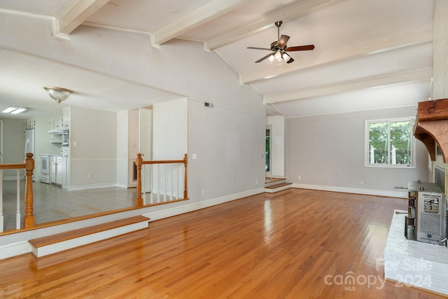 unfurnished living room featuring ceiling fan, lofted ceiling with beams, and hardwood / wood-style flooring