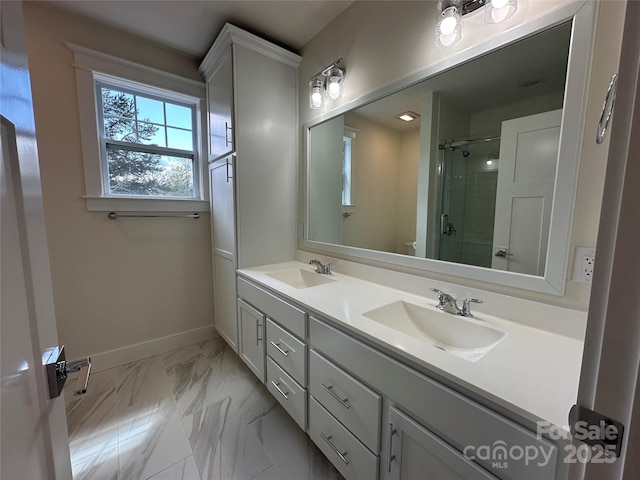full bathroom featuring baseboards, an enclosed shower, a sink, and toilet