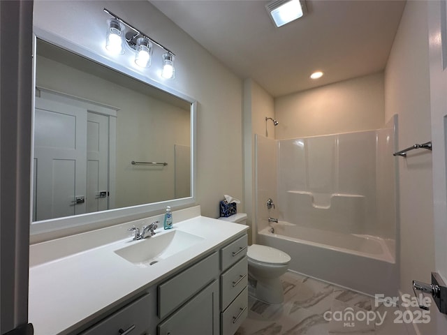 bathroom featuring vanity, recessed lighting, toilet, bathtub / shower combination, and marble finish floor