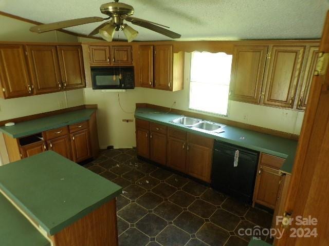 kitchen featuring ceiling fan, sink, lofted ceiling, a textured ceiling, and black appliances