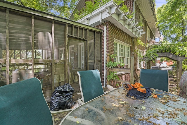 deck with a sunroom