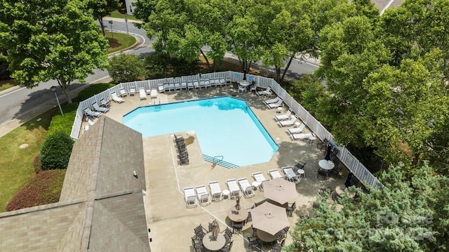 view of swimming pool with a patio area