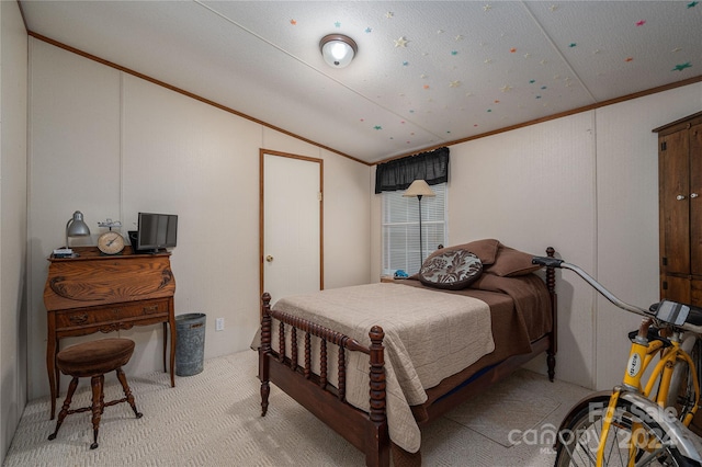 bedroom featuring light carpet, crown molding, and lofted ceiling