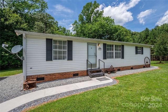 view of front of house with a front yard