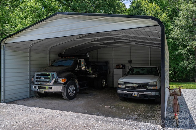 view of vehicle parking featuring a carport