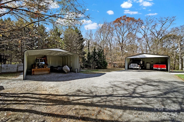 view of parking / parking lot featuring a carport