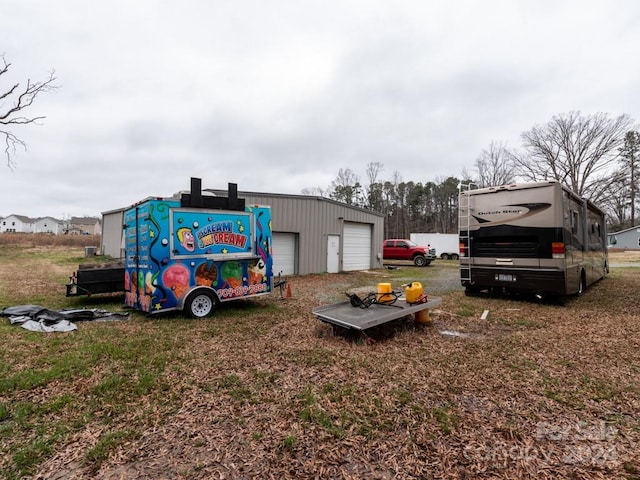 view of outdoor structure with a garage