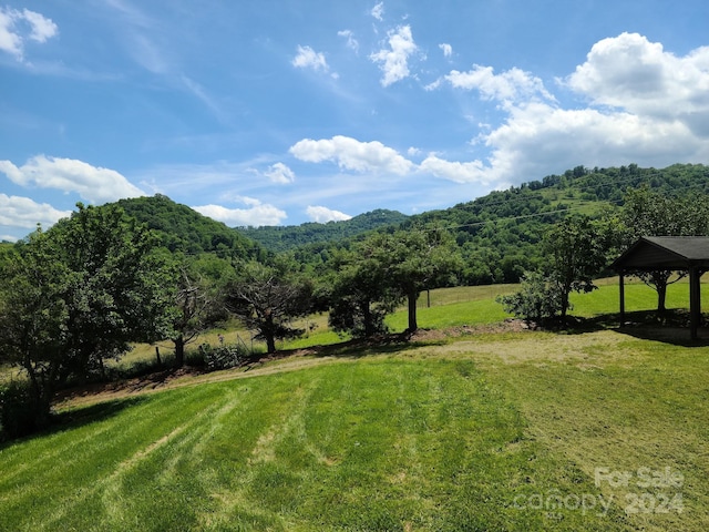 view of mountain feature with a rural view