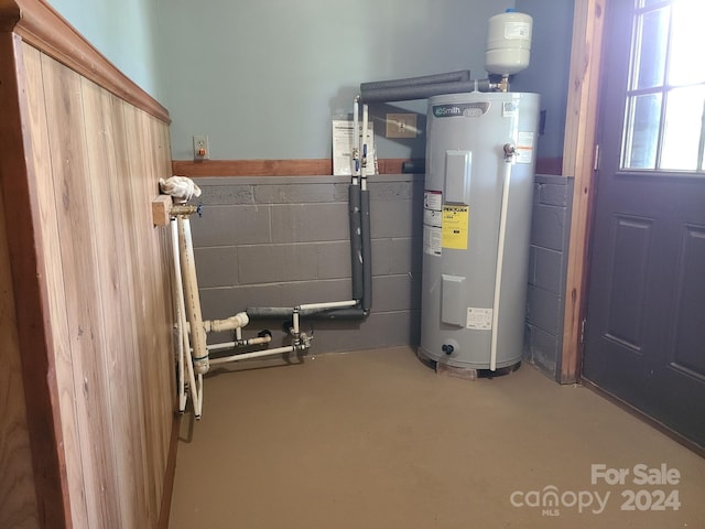 utility room with water heater