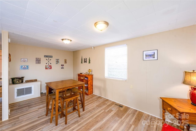 dining space featuring light hardwood / wood-style floors