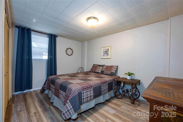 bedroom featuring light hardwood / wood-style floors