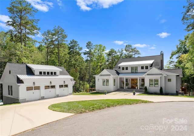 modern farmhouse with a garage