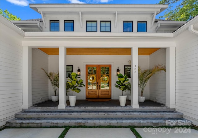 doorway to property with french doors