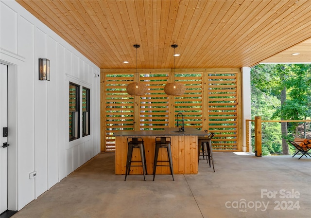 view of patio / terrace with an outdoor bar