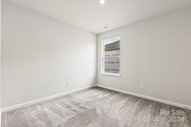 view of carpeted spare room