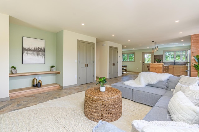 living room featuring sink