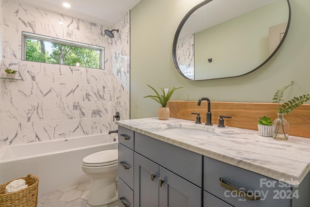 full bathroom with tile patterned flooring, vanity, shower / bath combination, and toilet