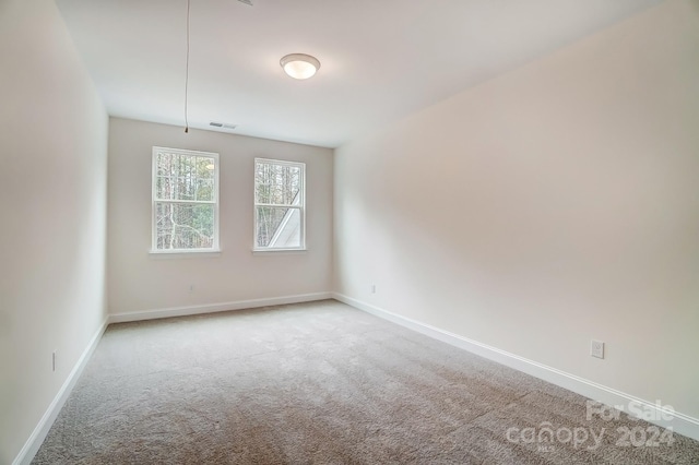 empty room with carpet floors