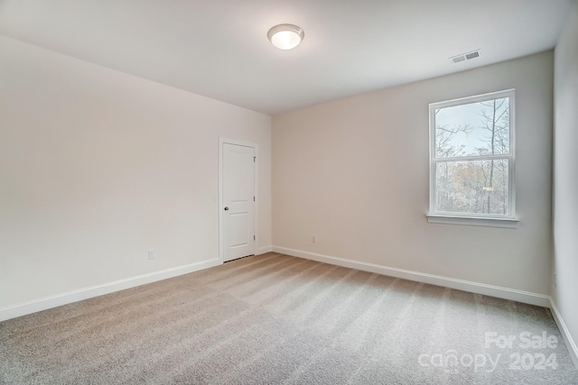 empty room with carpet floors