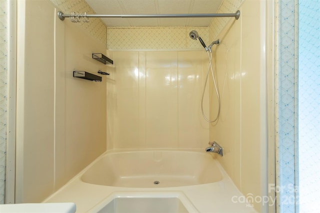 bathroom featuring washtub / shower combination