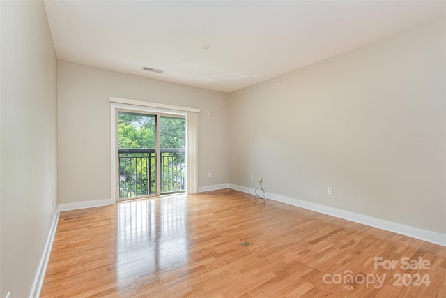 empty room with light wood-type flooring