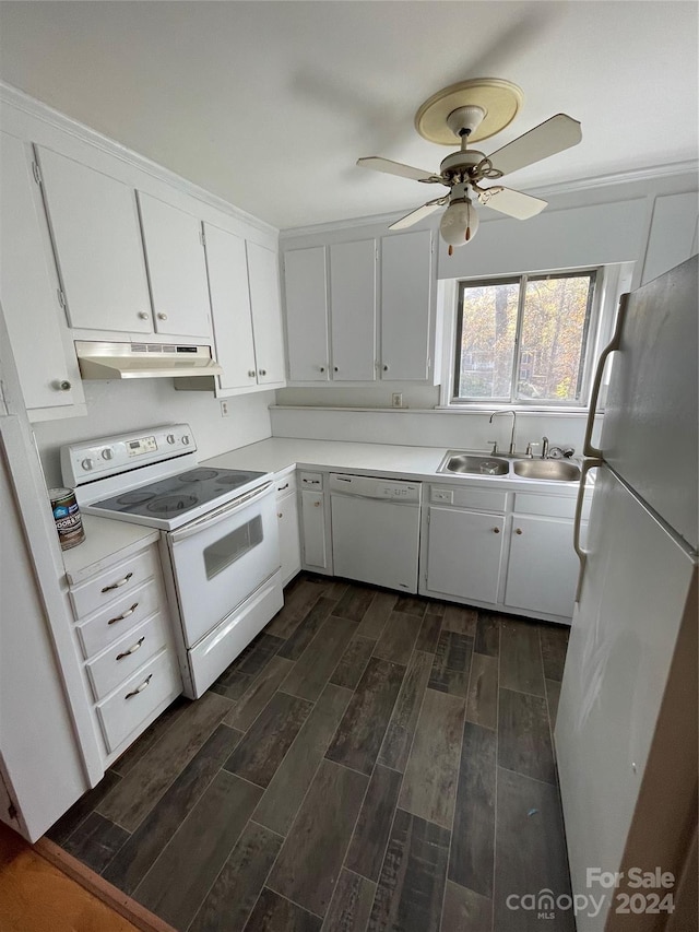 kitchen with dark hardwood / wood-style flooring, white appliances, ceiling fan, sink, and white cabinetry