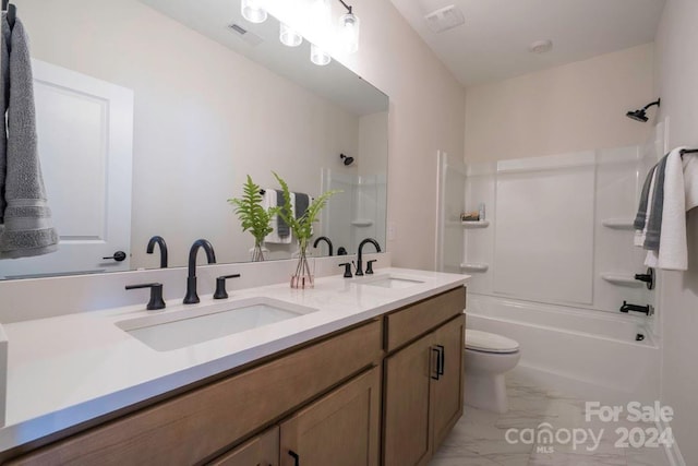 full bathroom featuring vanity, shower / bathing tub combination, and toilet