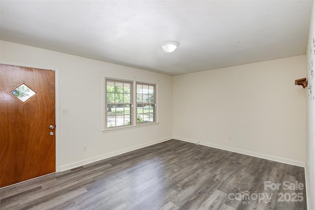 entrance foyer with dark wood-type flooring