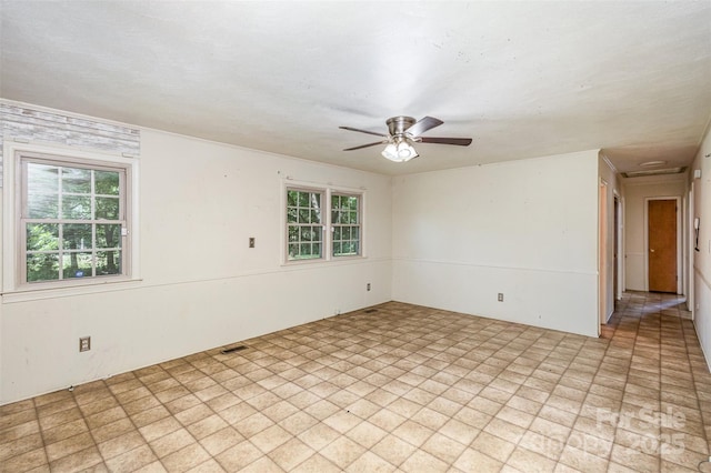 empty room with ceiling fan