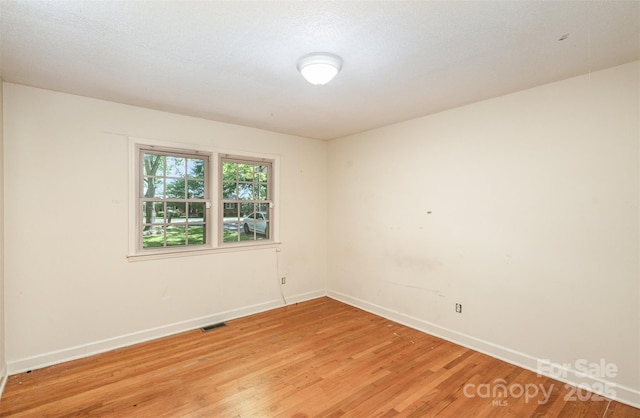 empty room featuring light hardwood / wood-style floors