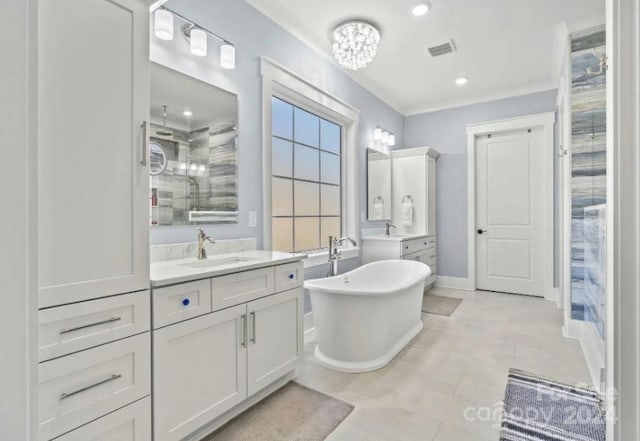 bathroom featuring an inviting chandelier, separate shower and tub, and vanity