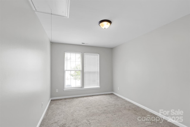 spare room with carpet flooring