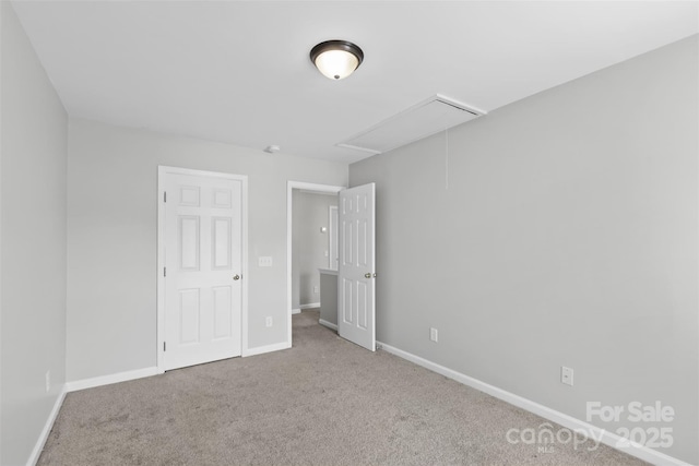 unfurnished bedroom featuring carpet