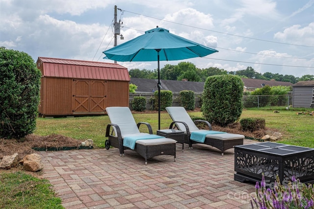 view of patio / terrace with a storage shed