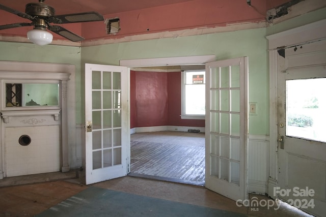 entryway with ceiling fan and french doors