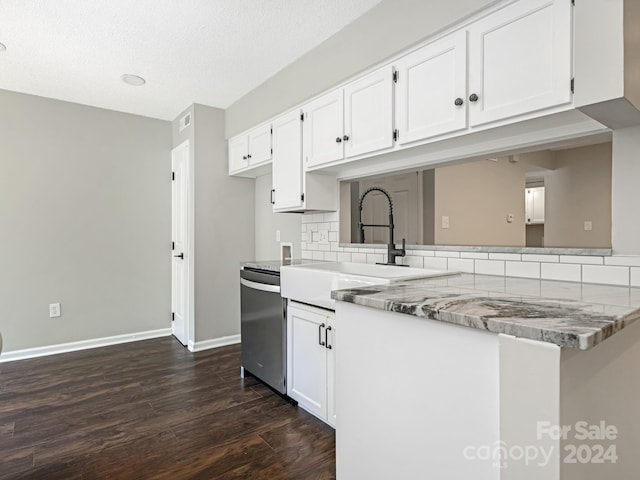 kitchen featuring dishwasher, dark hardwood / wood-style flooring, white cabinetry, and light stone countertops