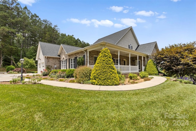 view of home's exterior with a garage and a lawn