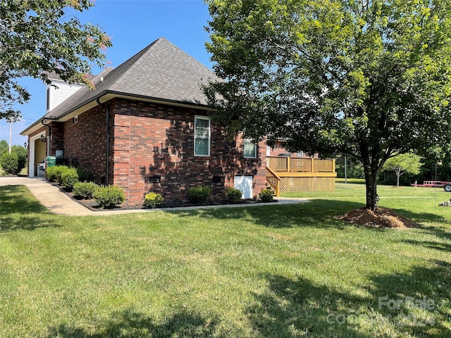 view of property exterior featuring a wooden deck and a lawn