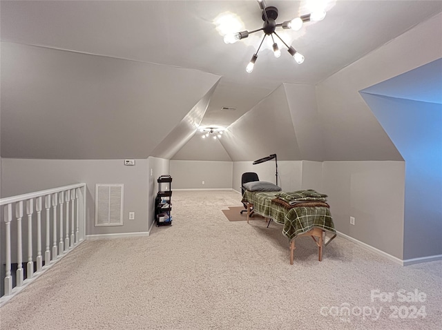 interior space with lofted ceiling, baseboards, and visible vents